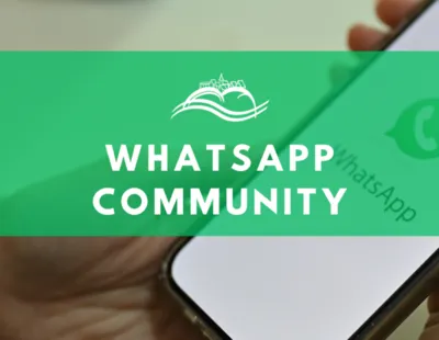 WhatsApp Community der Dorfgemeinschaft Bünzwangen – eine Hand hält ein Smartphone